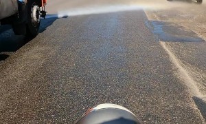 Scooter Tries To Zoom Past Street Cleaner