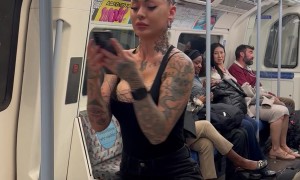 Girl Hanging by Her Hair in the Subway