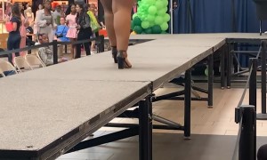 Woman Falls Off Runway During Shapewear Modeling