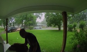 Woman Takes Fall After Hurrying in From The Rain