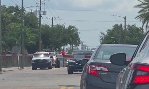 Impatient Drivers Go Around Train Crossing Rails