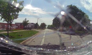 Collision With Flatbed Truck Backing Up Into Traffic