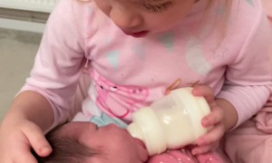 Blind Girl Feeling Her New Baby Sister