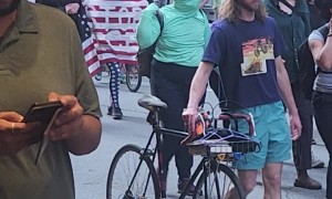 Car Drives Through Protest