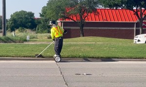 Landscaper Whacks Weeds on a Segway
