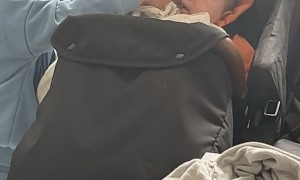 Toddler Feeds Chocolate Mousse to a Baby