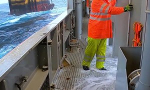 Huge Cold Waves Go Over the Side of the Boat