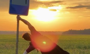 Street Sign Encourages Human Flag
