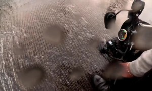 Motorcycle Slides Out From Rider On Wet Roads