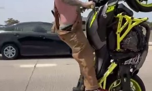 Stunt Rider Crashes Bike on Highway