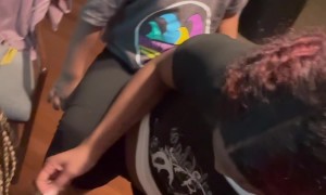 Super Stylist Balances Baby While Braiding at Top Speed