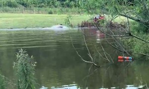 Sled Skids Across Water Pulled by ATV