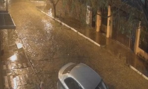 Father and Daughter Both Slip in the Rain