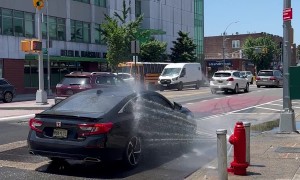 Malfunctioning Fire Hydrant Used As Free Car Wash
