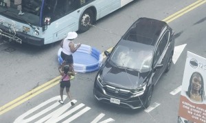 Inflatable Pool In the Middle of an NYC Street