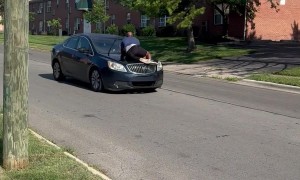 Columbus Man Clings to Screeching Car Hood