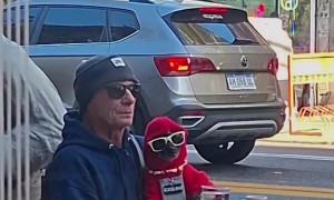 Dripped Out Dog Sits At Outdoor Table