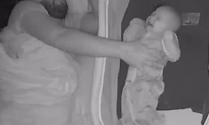 Doodle Cuddles Dad Who Is Comforting Newborn