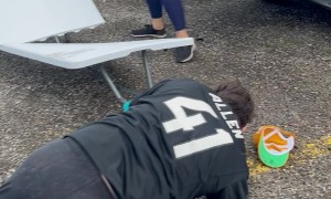 Man Takes Hard Fall While Trying to Jump Through Table