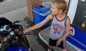 Motorcyclist Lets Kid Rev His Engine