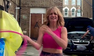 Woman Spins Hula Hoop On Breasts