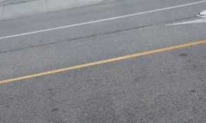 Man Threatens Pedestrian With Pickaxe