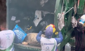 Garbage Men Save Teddy Bear From the Trash