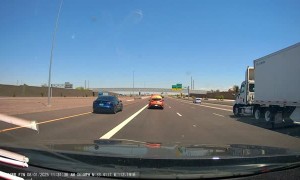 Car Drives on Freeway With Its Hood Up