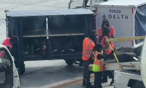 Delta Baggage Handler Throwing Bags