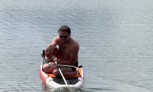 Dicaprio Lookalike Rides Paddle Board