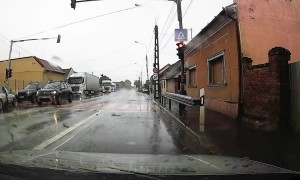 Cement Mixer Truck Rear-Ends Car at Intersection