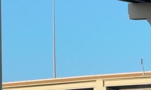 Tow Truck Carries Flaming Vehicle