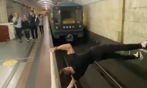 Extreme Stunt in Moscow Underground Metro Station