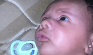 Baby Outraged by His Dad's Snoring