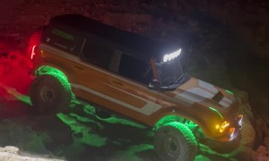 Bronco Slides Down Steep Rocks