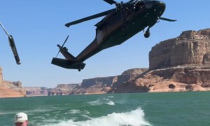 Blackhawk Helicopter Creates New Waves For Wake Surfer