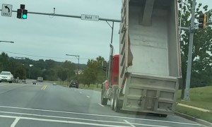 Dump Truck Collides With Traffic Light