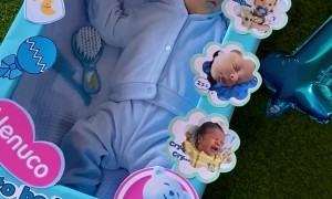 One-Month-Old Baby Sleeps in Baby Doll Box