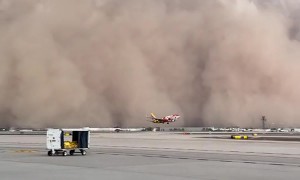 Massive Dust Storm Rolls in as Plane Takes Off