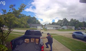 Man Loses Balance When Stepping Down From Pickup