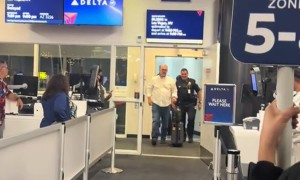 Police Escort Obnoxious Passenger Off Plane