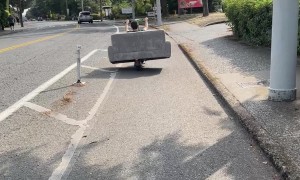 Couple Use Electric Scooter To Transport Couch