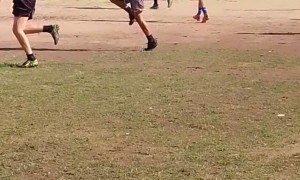 Young Football Players Practice High Knees