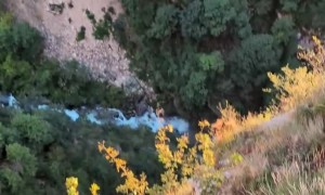 Precarious Walk On Picturesque Ledge