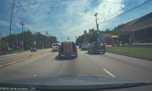 Truck Loses Load of Paving Stones at Green Light