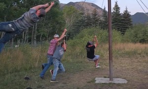 Men Play On Redneck Merry-Go-Round