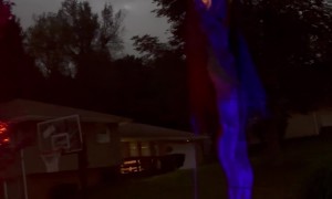 Giant Animatronic Scarecrow at Night