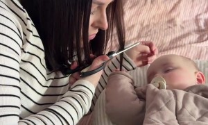 Mom Cuts Hair to Avoid Waking Baby