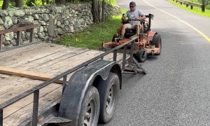 Mower Does a Wheelie Off the Trailer