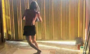 Girl Slips and Dumps Bucket on Herself While Mopping